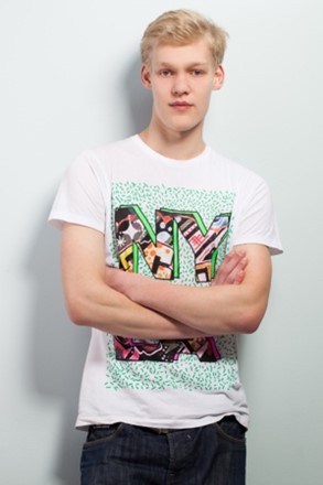 A young man wearing a statement t-shirt