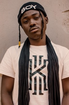 A young man wearing a statement t-shirt